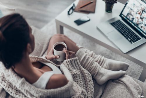 skin-care-institute-april-2020-tulsa-ok-blog-1 skin care institute - woman sitting on couch with coffee and computer