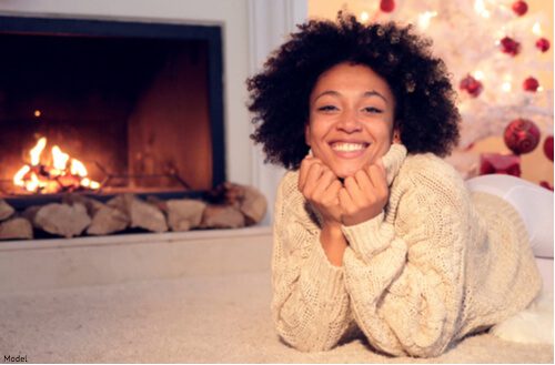 skin-care-institute-november-2020-tulsa-ok-blog-1 skin care institute - woman sitting next to a fire