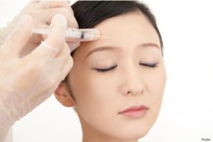 woman receiving botox treatment