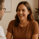 Smiling woman having a consultation with a doctor in a clinic.