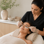 Aesthetic provider performing an under-eye cosmetic treatment on a patient